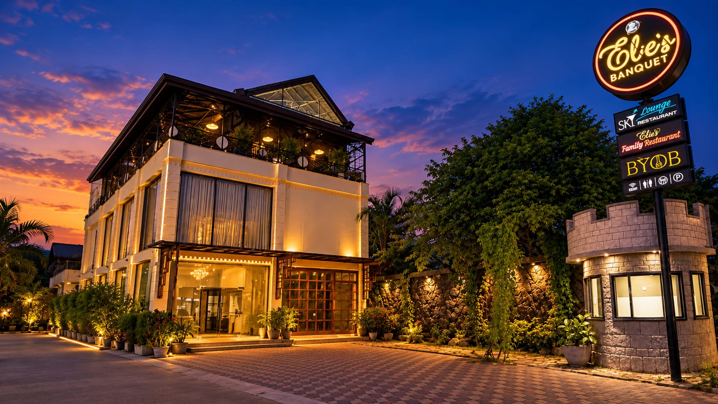 Elie's Banquet and Sky Lounge, lit up at dusk